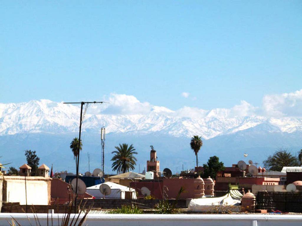 Riad Palais Des Princesses & Spa Marakéš Exteriér fotografie View of the Atlas Mountains from Marrakech